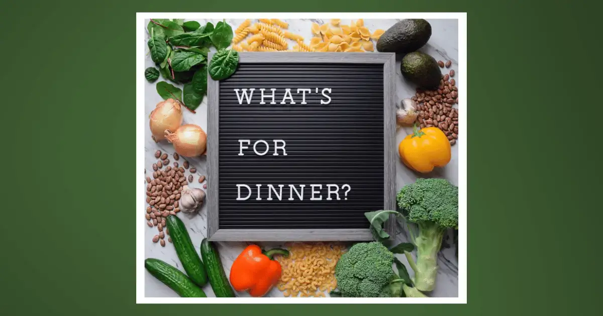What's for Dinner letter board with fresh vegetables and pasta